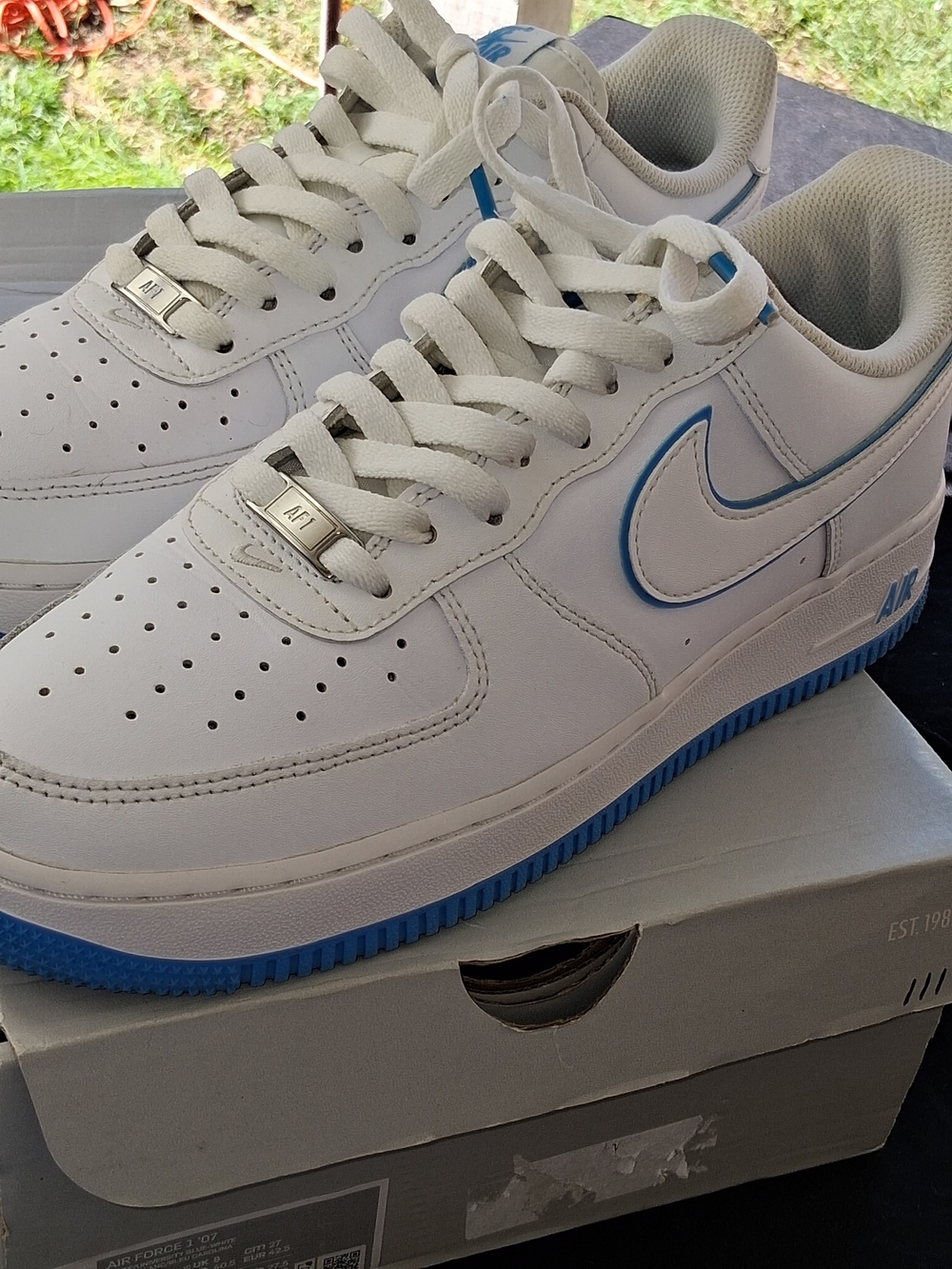 Nike White and Blue Air Force 1 Low Athletic Sneakers